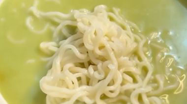 Chilled pani puri noodles topped with vegetables, sev, and crushed puris